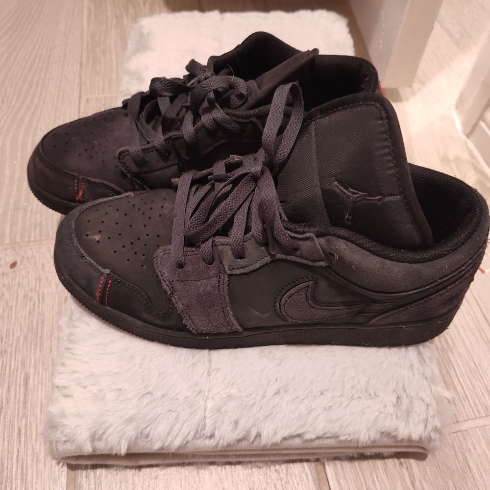 Black Nike Sneakers with Red Accents
